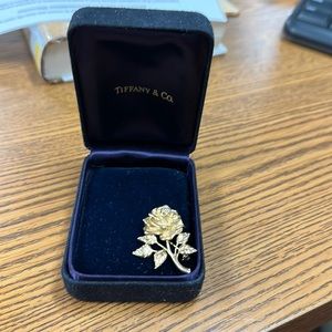 Ladies Tiffany & Co 14kt yellow gold rose brooch with .05ct genuine diamond.